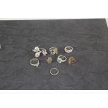 A group of nine silver and white metal dress rings, gross weight 32.5grams