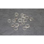 A group of eighteen 925 grade white metal and silver rings 32.6grams gross