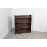 A Remploy stained-wood four tier bookcase 89cm x 76cm x 21.5cm