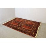 A Royal Keshan machine made rug of Persian design 170cm x 240cm