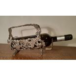 Cast white metal 'Fruiting Vine' wine basket, sold with a 75cl bottle NPU Amontillado Sherry