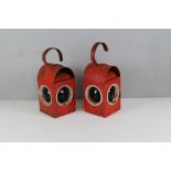 A pair of vintage red-painted railway/road-work lamps, marked GEOPI, 37cm