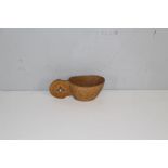A Scandinavian carved wooden jug, of typical form and design 14cm