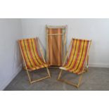 Three mid-century deck chairs, with typical striped material (1AF)