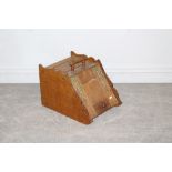 A Victorian oak coal scuttle, with pierced brass strap hinges 32cm x 33cm x 48cm