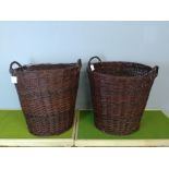 Two large woven wicket log baskets (minor damage) 60cm