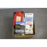 A box of walking, history, and wildlife books