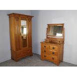 An Edwardian ash single mirror door wardrobe 200cm x 108cm x 54cm and matching dressing chest