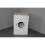 A Zanussi Dual Temperature tumble dryer TD4112W 84cm high x 59cm wide