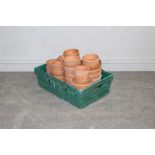 A quantity of un-glazed terracotta pant pots, varying sizes
