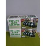 Two GreenKey rolling lawn aerators, boxed, RRP 39.99