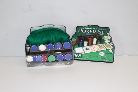 A Poker Stuff professional Texas Hold'em Poker Set, contained in a tin box 9.5cm x 25cm x 20cm