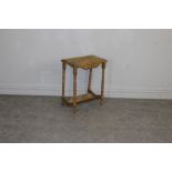 A small pine occasional table with turned supports and book trough under-tier 59.5cm x 45cm x 30cm