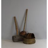 A copper headed posser, wooden mallet and two garden riddles/sieves