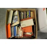 A box of travel, fiction and non-fiction books