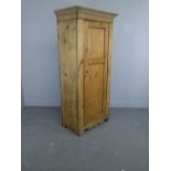 A 19th century pine hall cupboard, hanging space to interior 189cm x 91cm x 53cm some repairs