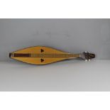 A Gremlin Appalachian Dulcimer musical instrument 85cm requires re-stringing