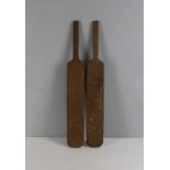 A pair of vintage oak children's cricket bats, impressed P.Hardwick 68cm