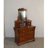 A Victorian mahogany dressing chest with rectangular plate and fielded panelled drawers, with