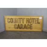 'County Hotel Garage' a group of vintage pine sign lettering re-mounted to a pine board,