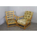 A pair of Ercol pine easy armchairs 80cm , one chair with damage to arm