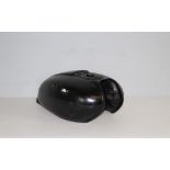 A vintage black-painted motorcycle fuel tank, unmarked, cap missing 48cm long