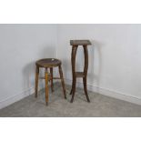 A late 19th century elm and moulded laminate stool 57cm and a carved hardwood plant stand (slight