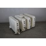 Four Dimplex Eco Cadiz electric radiators, each with remote control 61cm x 72cm x 17cm