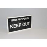 A painted metal 'MOD Property KEEP OUT' sign 30.5cm x 55.5cm