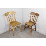 Two 19th century ash and elm kitchen chairs, non matching, each with turned supports 82cm & 85cm