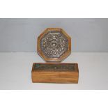 Two Indian/Burmese embossed white metal mounted hardwood boxes, one oblong 5cm x 17cm x 6cm and