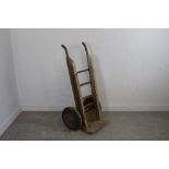 A vintage iron-framed and wooden clad bottle barrow 119cm
