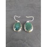 A pair of white metal and green stone earrings 2cm