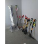 A quantity of garden tools, long handled edging shears, long handled lawn shears, edging knives, ash