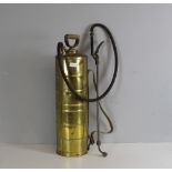 A vintage brass backpack garden sprayer 70cm