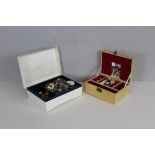 Two vintage jewellery boxes containing a quantity of costume jewellery, bead necklaces, earrings