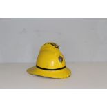 An Isle Of White Fire Brigade helmet, manufactured by Helmets Ltd, Wheathamstead, Herts, number