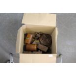 A box of wooden and treen items, including marking gauges, moulding plane, desk stand, circular
