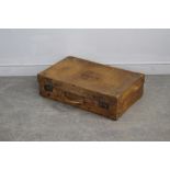 A vintage brown leather suitcase, initialled H.J.D.P 17cm x 66cm x 40cm