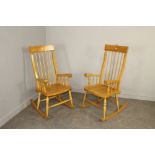 A pair of modern craftsman made sycamore rocking chairs, with spindle backs and turned supports