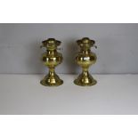 A pair of brass table oil lamps, in the antique style, with twin adjusters 26cm