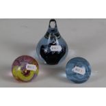 A group of three Caithness glass paperweights, Saracen, Mooncrystal(blue) and Mooncrystal (