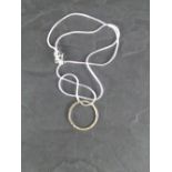 A fine 925 grade white metal chain with textures annular pendant (unmarked) 42cm