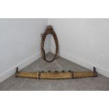 A vintage iron-bound horse collar 59cm and swingletree 118cm