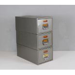 A group of three 'Cope-Chat Business Systems' metal filing drawers 16cm x 21.5cm x 40cm