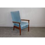 A mid-century Parker Knoll lounge chair model number PK 773/4, upholstered in blue material 91cm