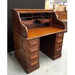 1930's panelled oak tambour top pedestal desk