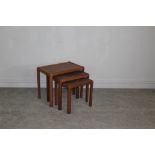 A nest of three imported teak tables, largest 45cm x 55cm x 36cm