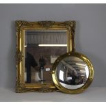 A modern ornate rectangular gilt framed mirror in the antique style 66cm x 55cm and a reproduction
