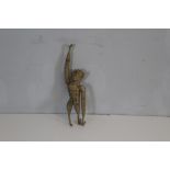 A vintage rattan hanging monkey 40cm